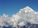 207 Jerome Ryan Happy After Arriving At Thulo Bugin With Dhaulagiri Jerome Ryan was very happy to arrive at the large grassy field called Thulo Bugin after two hours of hard trekking from Shepherd�s Kharka. We stopped briefly at Thulo Bugin to rest and snack.